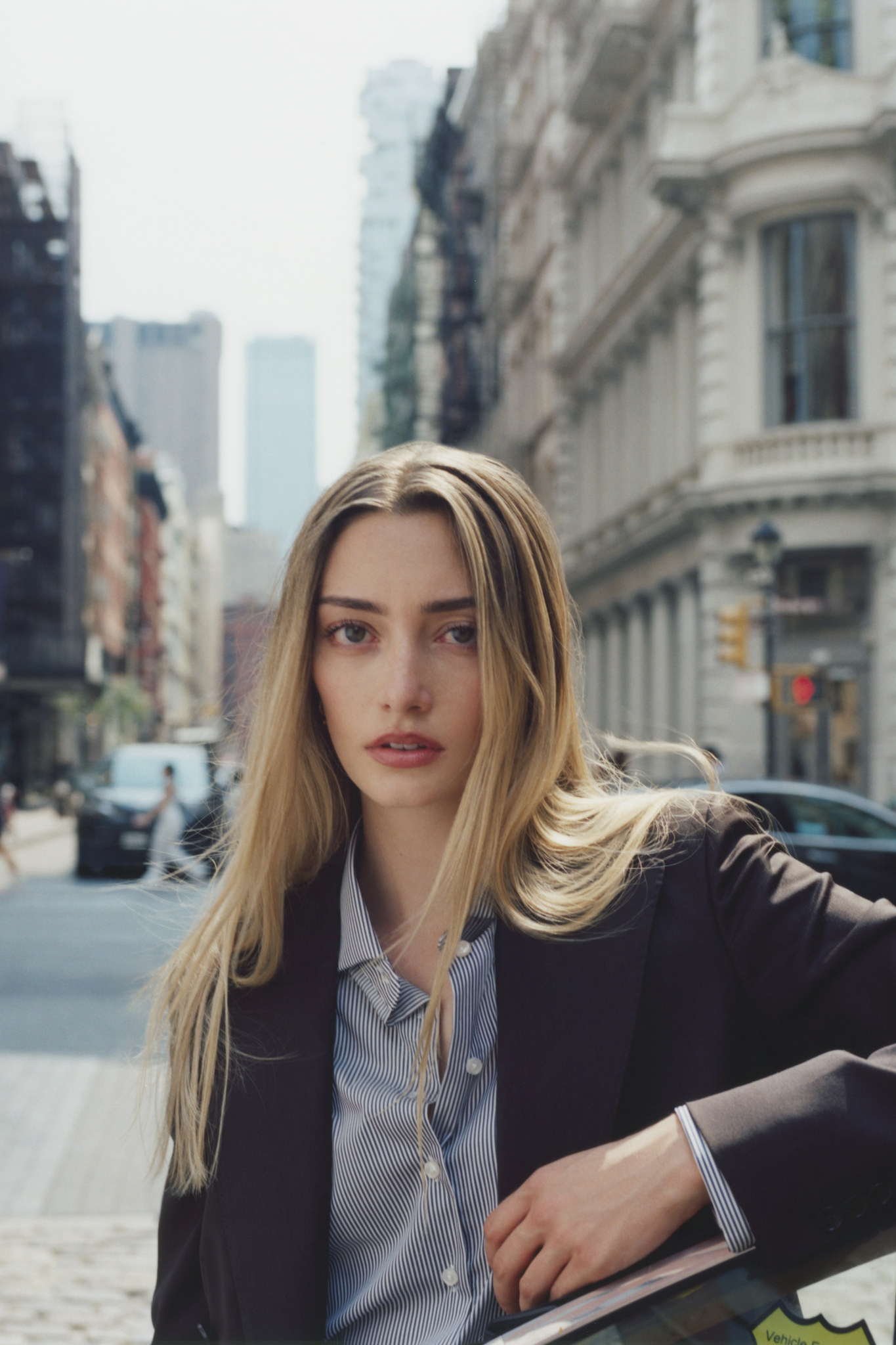 Female model in a dark Clements+Church jacket on a New York street
