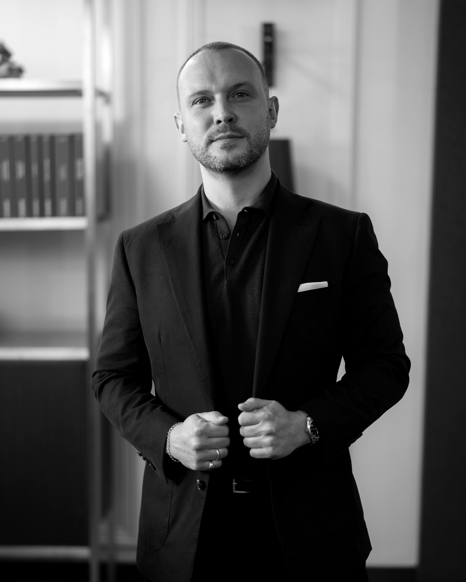 Marco Berezny, Oxford Tailor, in a dark tailored jacket and polo shirt